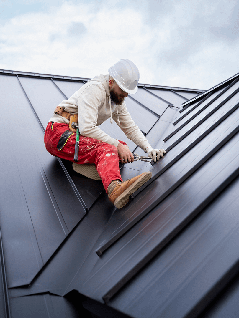 Worker Installing Roof